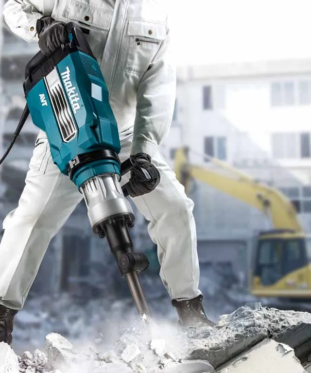 Makita HM1511 Máy đục bê tông(chuôi lục giác 30mm/avt)